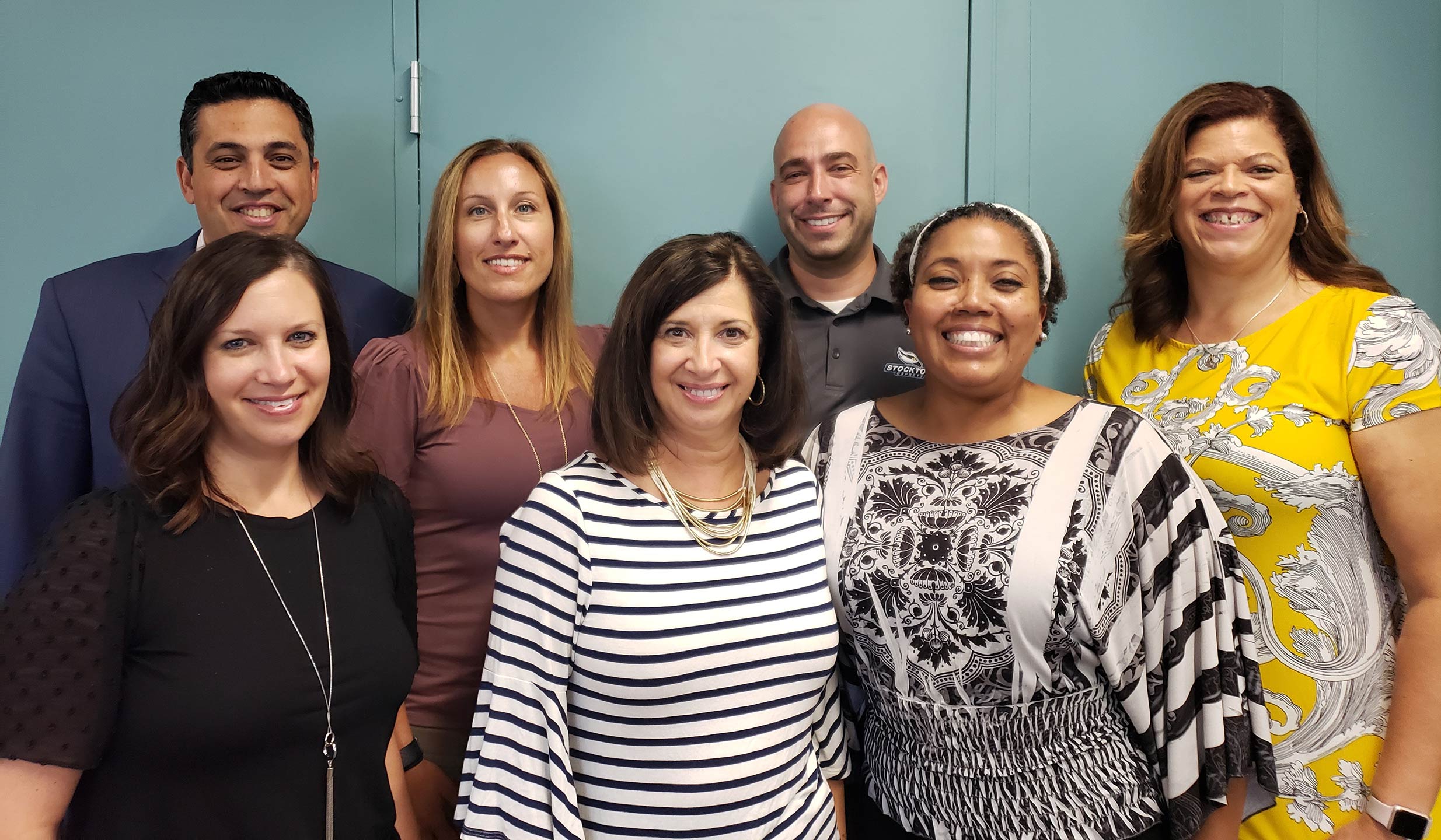 Back row from left, Walead Abdrabouh, director of Information Systems & Business Intelligence; Rhianon Lepree, director of Real Estate; Chris Connors, associate director of Financial Aid; and Ariane Newman, assistant dean of the School of Health Sciences. Front row from left, Marissa Levy, dean of the School of Social and Behavioral Sciences; Marie Ricci, senior executive assistant to the Vice President of Administration & Finance; and Lolita Treadwell, former deputy chief of staff. Not pictured Haley Baum, assistant dean of students, Stockton Atlantic City.