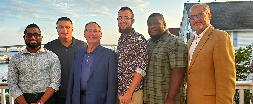 From left: Brandon Andrews, scholarship recipient; Max Torres, Student Relief Fund recipient; Dr. Ira Trocki, Stockton Student Relief Fund Benefit sponsor; Matthew Titus, Student Relief Fund recipient; Michael Faulk, Student Relief Fund recipient; and Vince Papaccio, longstanding Student Relief Fund supporter.