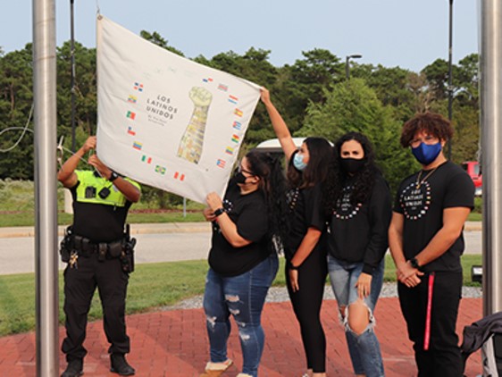 Students Raise Flag for Hispanic Heritage Month