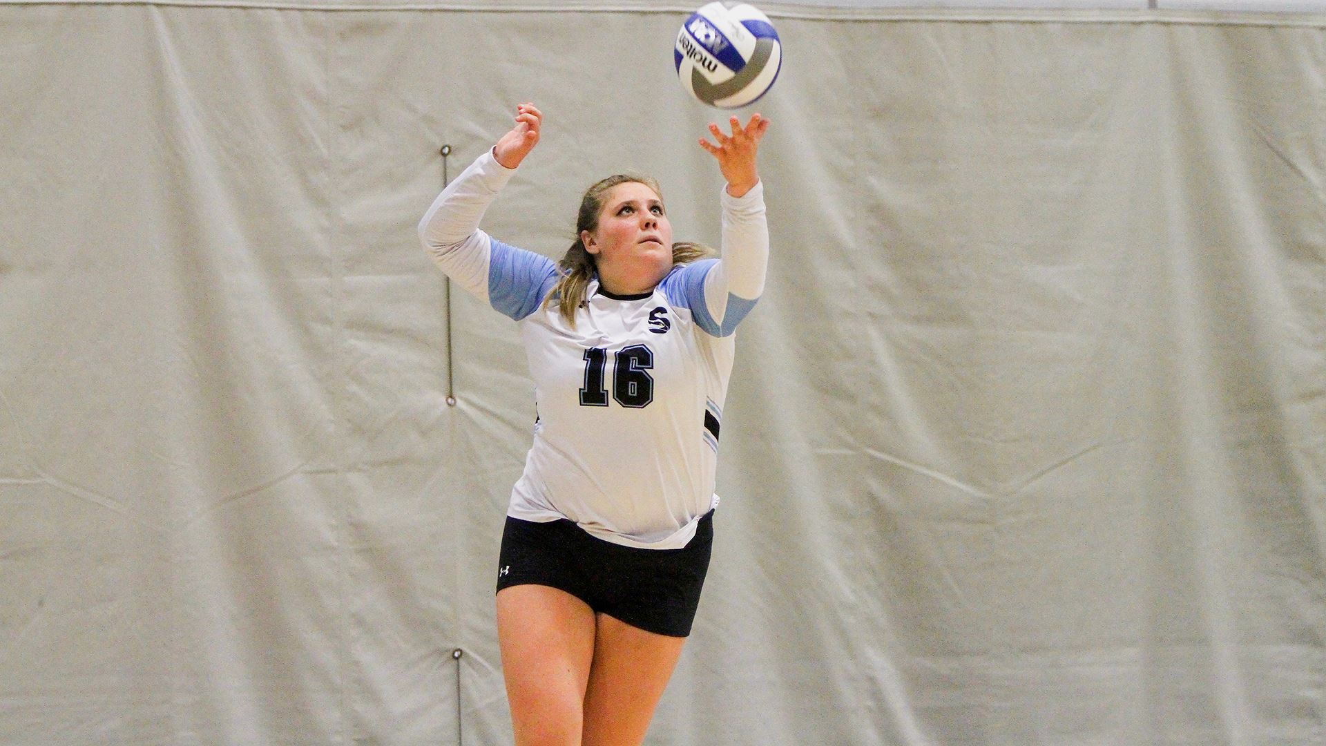 girl playing volleyball 