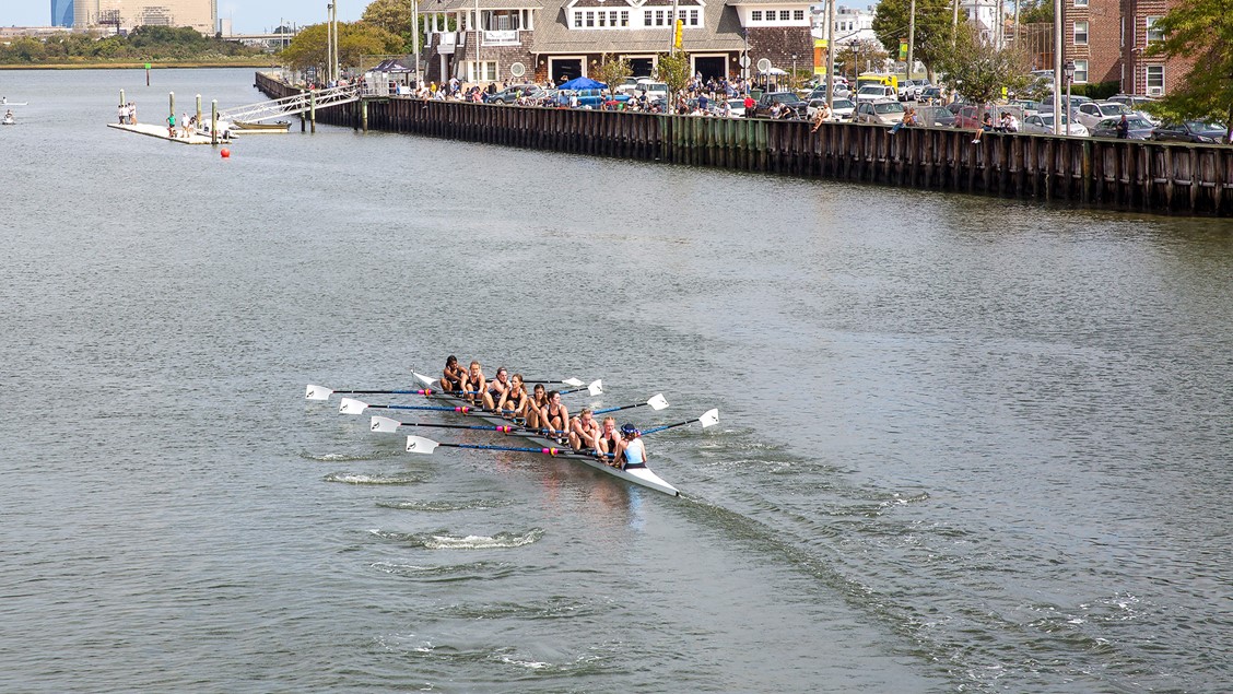 women rowing crew  boat