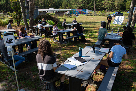 students learning outdoors 