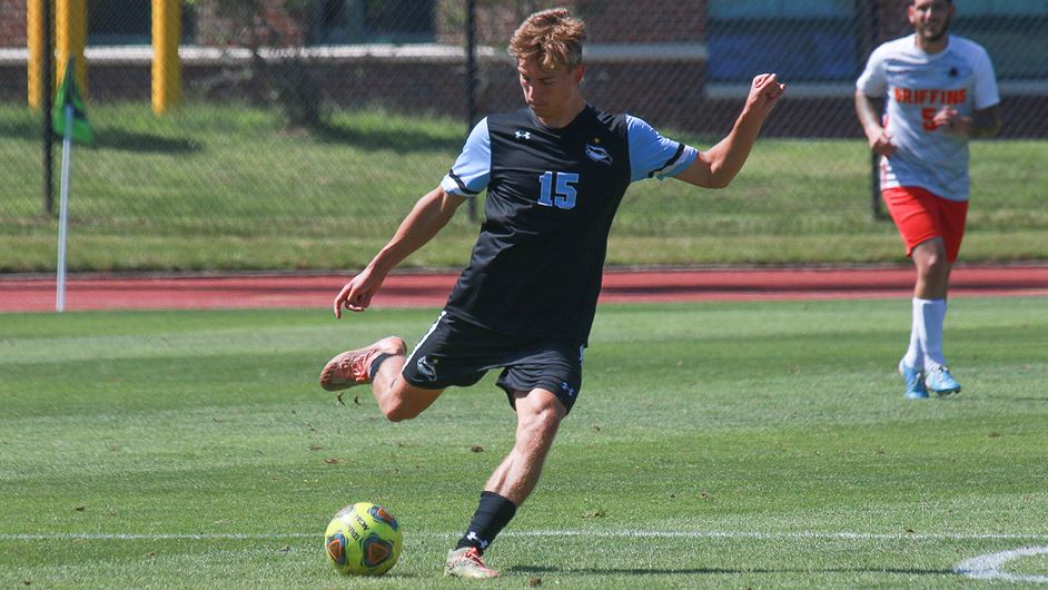 Student playing soccer