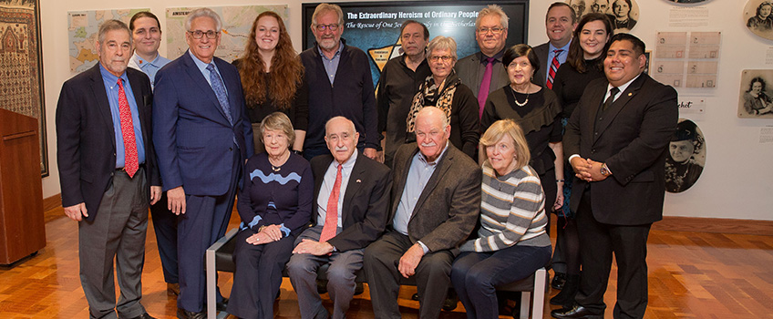 Seated from left, Katherine and Leo Ullman, and Hank and Kathy Ullman, with Hoogenboom family members and Stockton faculty and staff who helped create the exhibition