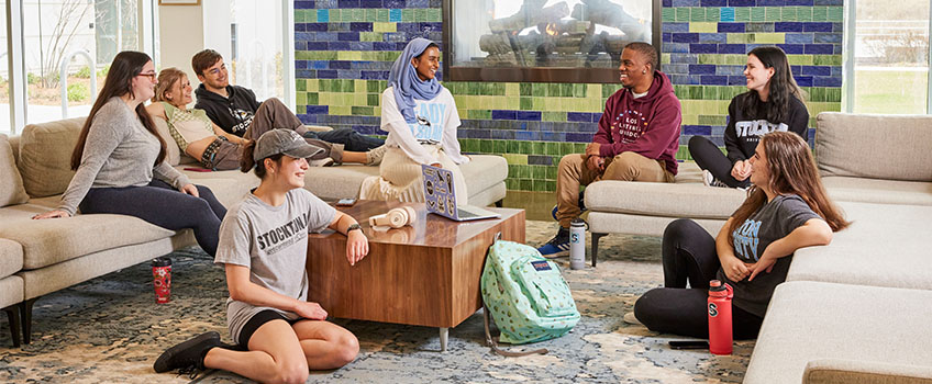 students sitting around lounge