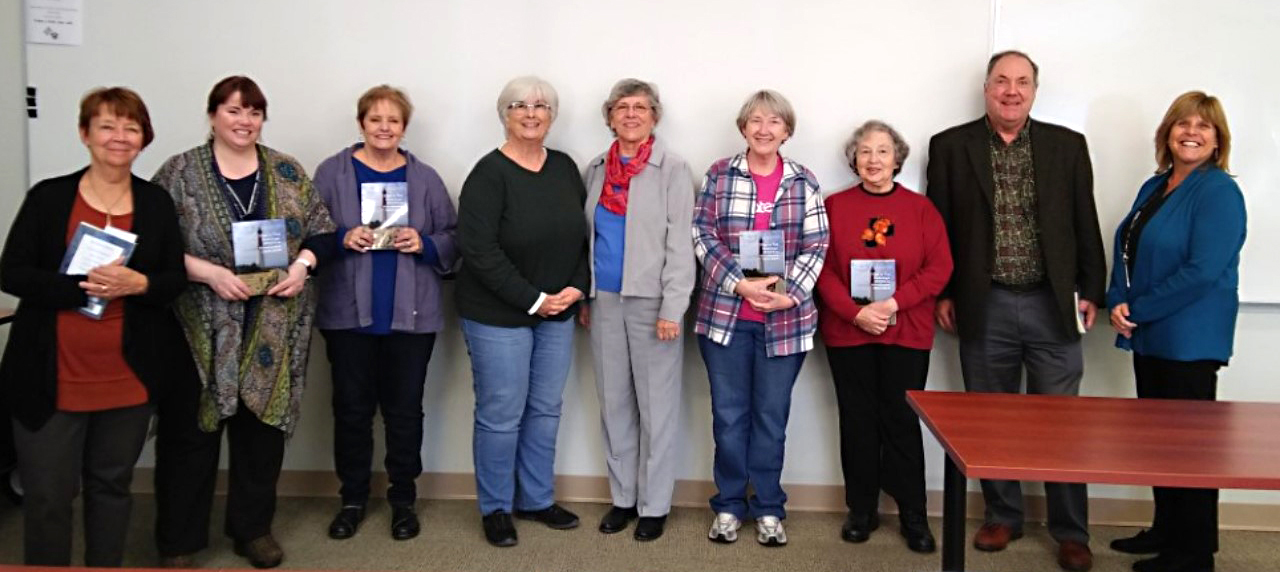 Pictured from left to right: Mary Blakeslee, Maguire, Regina "Sue" Hofer, Cathy Cowing, Caroline Jordet, Shawn Cseh, Norma Hochman, David Burdick, director of SCOSA and professor of Psychology; and Michele Collins-Davies, director of Stockton University Manahawkin.