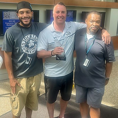 Jim Gwathney with Mario Laing and Stockton men's basketball coach Scott Bittner