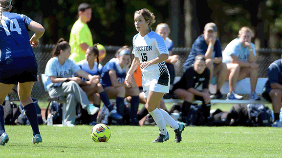 girl playing soccer 