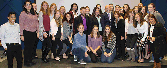 Anthony Melchiorri with Associate Professor Donna Albano and students. Below: Gary Rosenberg asks questions and Melchiorri expounds on doing "simple things from the heart."