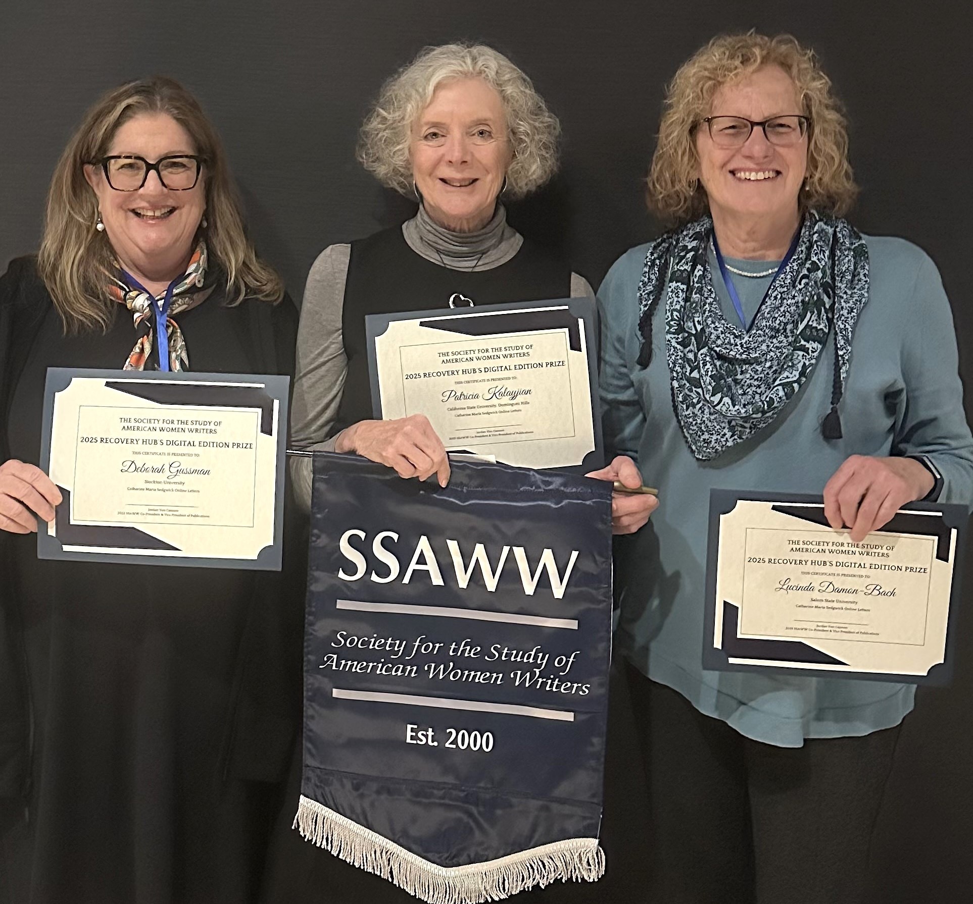 Gussman, left, with fellow CMSOL editorial team members