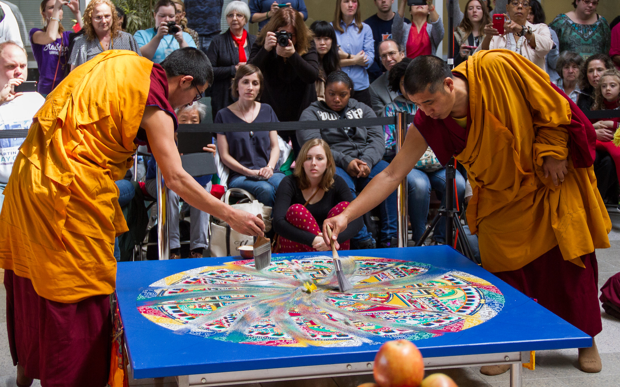 Tibetan Monks creating sand mandala