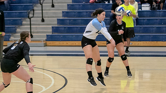 woman hitting volleyball