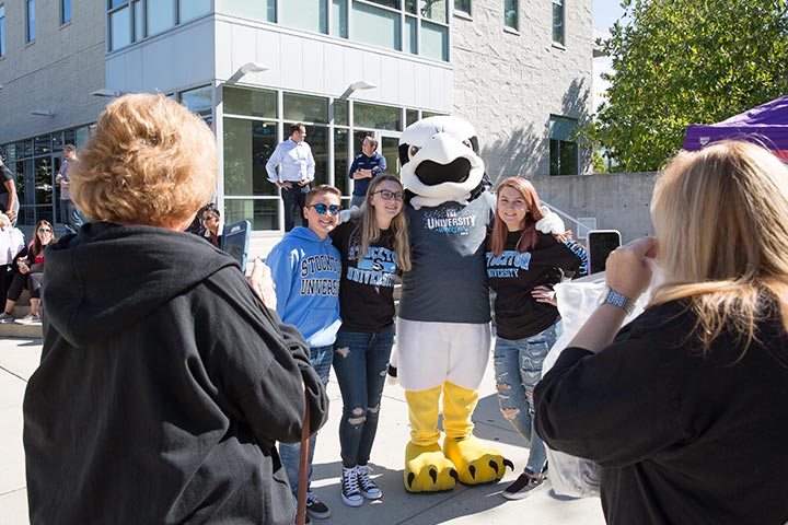 Students taking photo at University Weekend