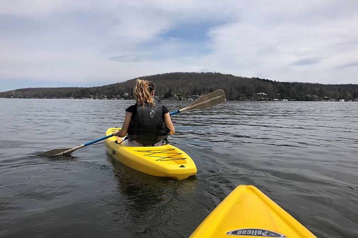 Back of girl on a kayak