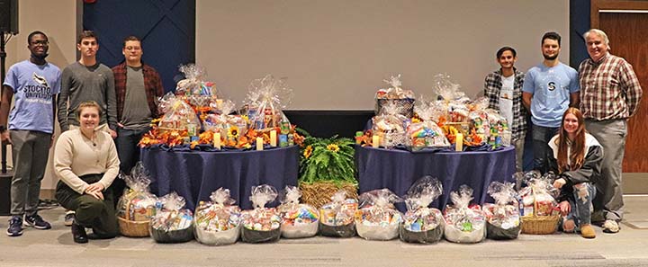 Students with gift baskets