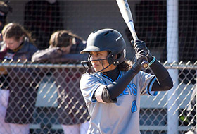 Photo of Meg Murzello playing softball