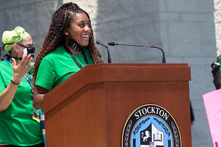 Danielle Combs at podium