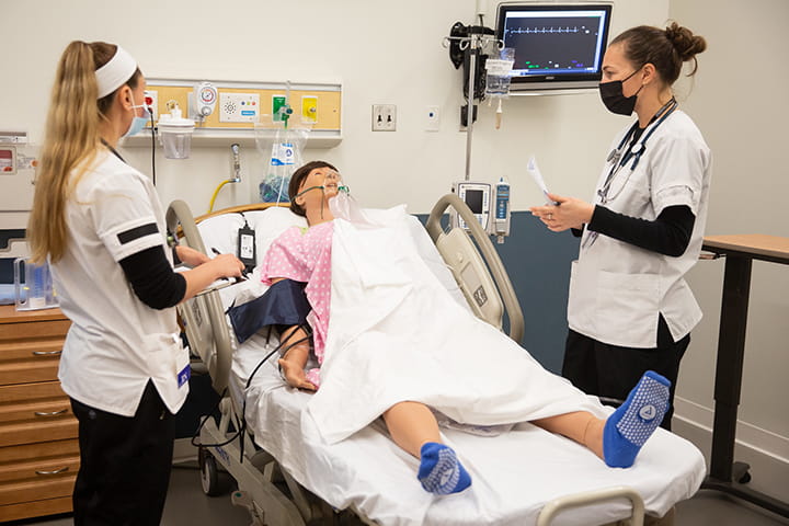 Nursing Students in lab Nursing Students in lab