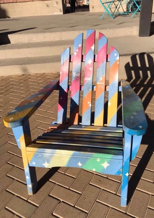 One of the painted adirondack chairs