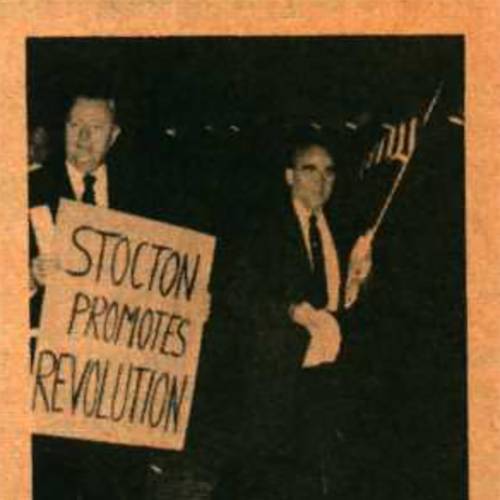 Reverend Carl McIntire marched on the Boardwalk holding sign that says, "Stockton Promotes Revolution"