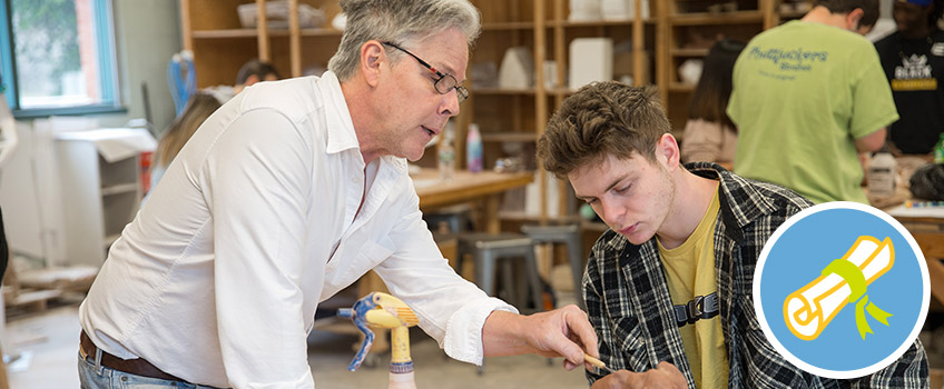 Professor instructing a student