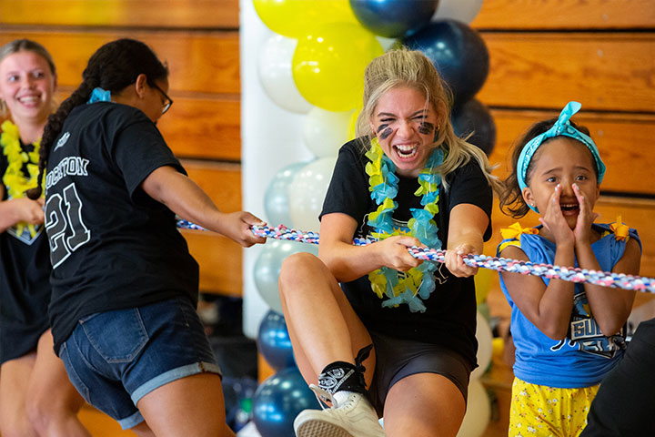 students participating in a tug-of-war