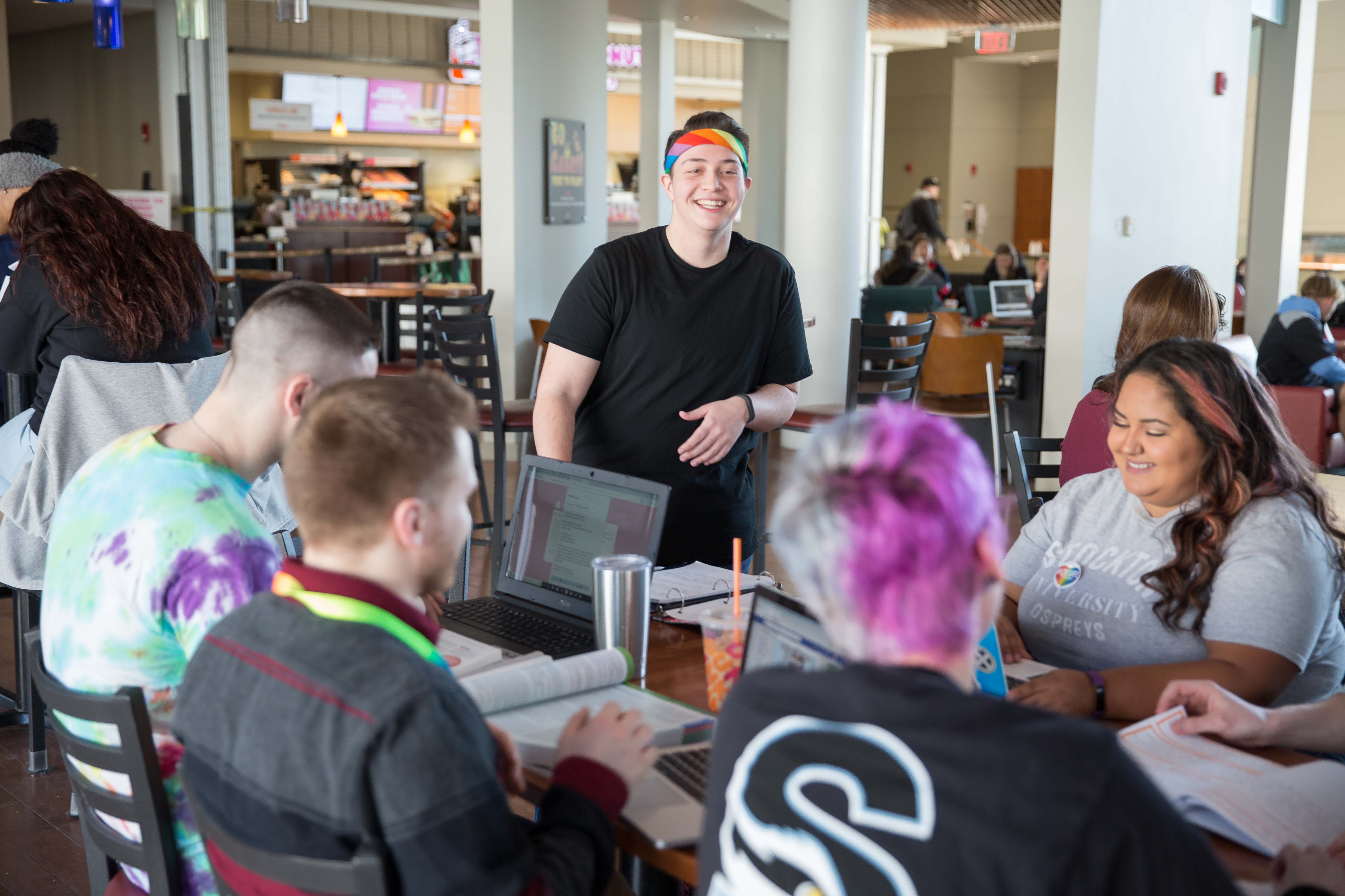 Students hanging out at Dunkin Donuts lounge