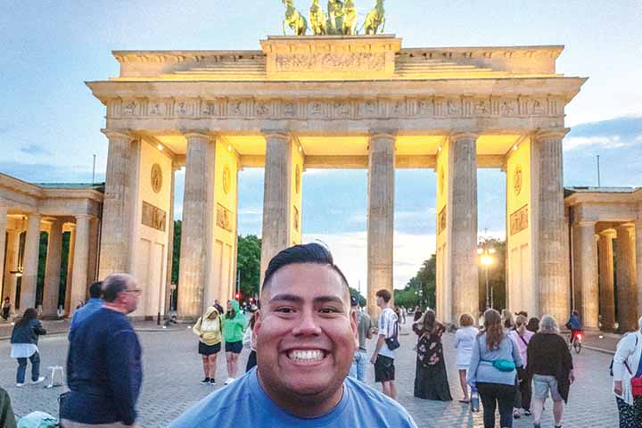 Irvin Moreno-Rodriguez in front of the Brandenburg Gate in Berlin